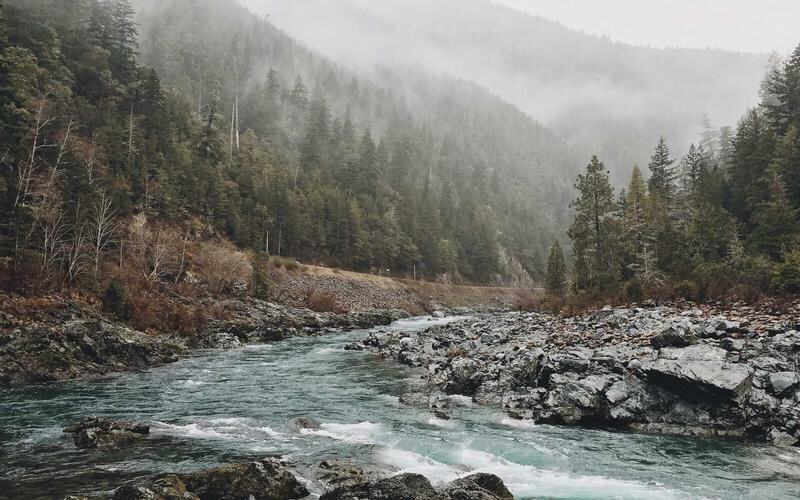 The same river gorge with the hiker seamlessly removed